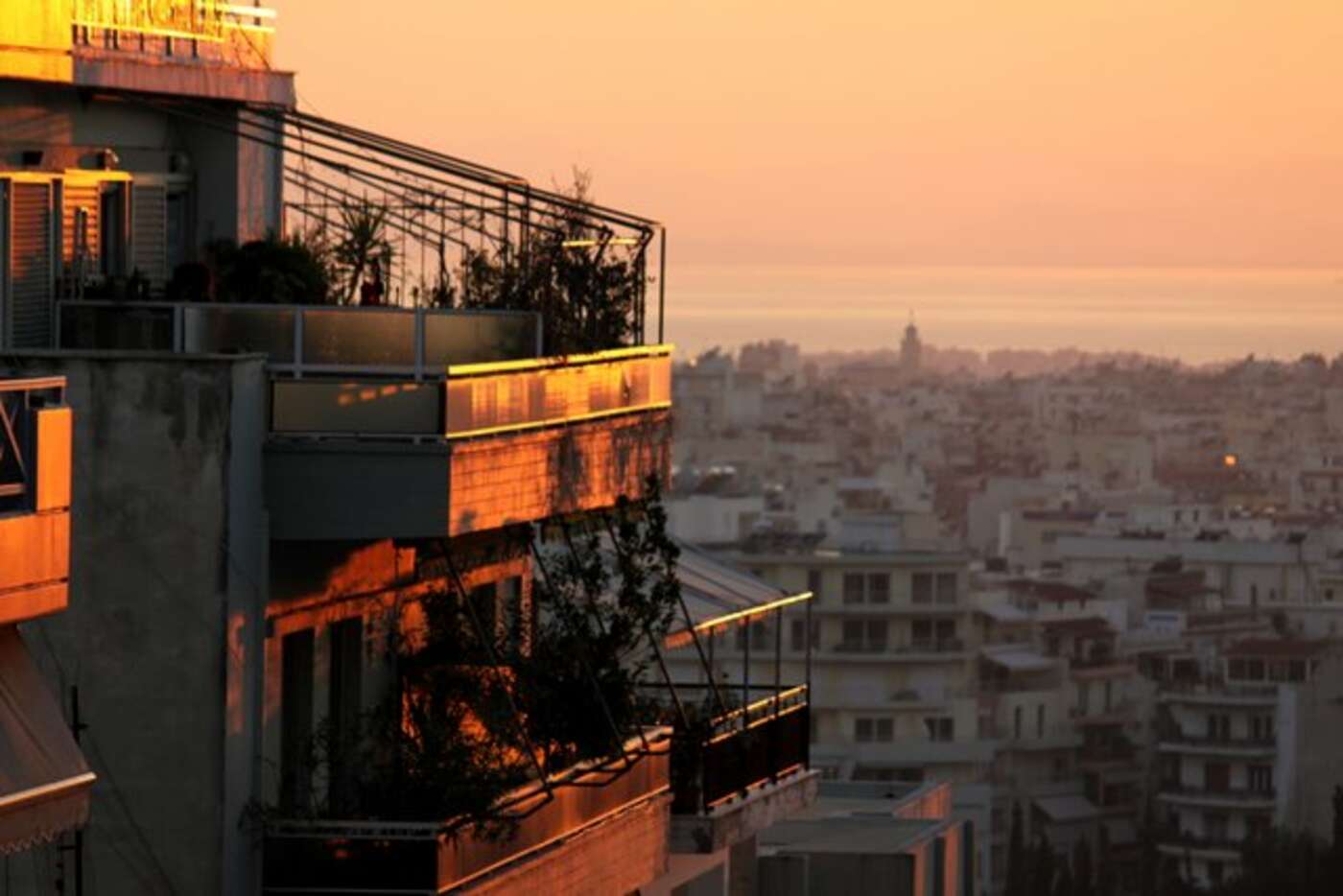 Watching the sun rise over the Aegean, Athens, Greece